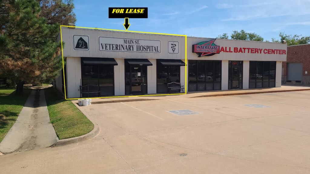Veterinary hospital and ball game store side by side.